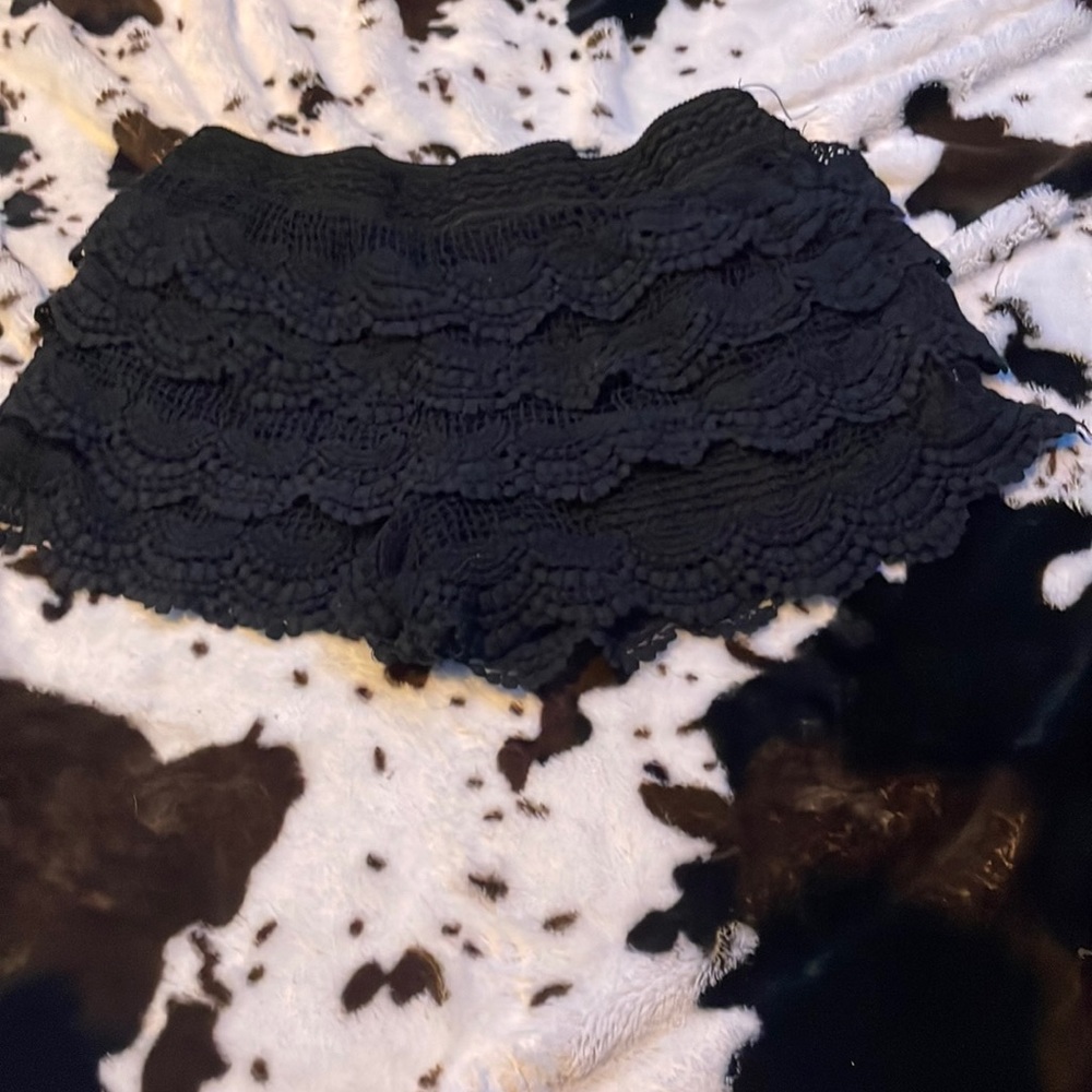 black fringed shorts